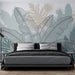 Une chambre moderne avec un papier peint tropical aux grandes feuilles stylisées en noir et pastel, créant une atmosphère apaisante et élégante.