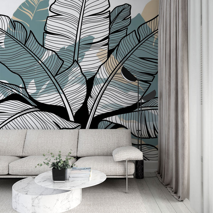 Un salon contemporain avec un papier peint tropical aux grandes feuilles stylisées en noir et vert, créant une ambiance fraîche et apaisante.
