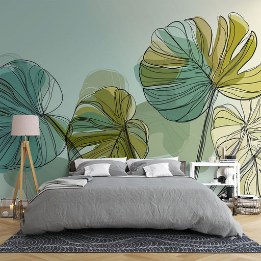 Une chambre moderne avec un papier peint aux grandes feuilles stylisées dans des teintes vertes et jaunes sur fond pastel, créant une atmosphère apaisante et naturelle.