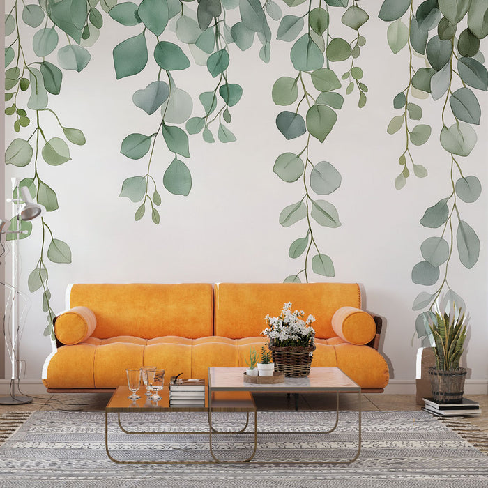 Un salon moderne avec un papier peint représentant des feuilles vertes délicates tombant du plafond, créant une atmosphère apaisante et naturelle.
