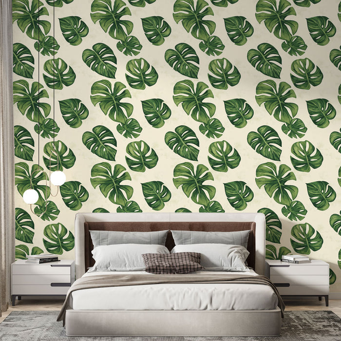 Une chambre moderne avec un papier peint tropical représentant de grandes feuilles vertes sur fond clair, créant une atmosphère fraîche et apaisante.