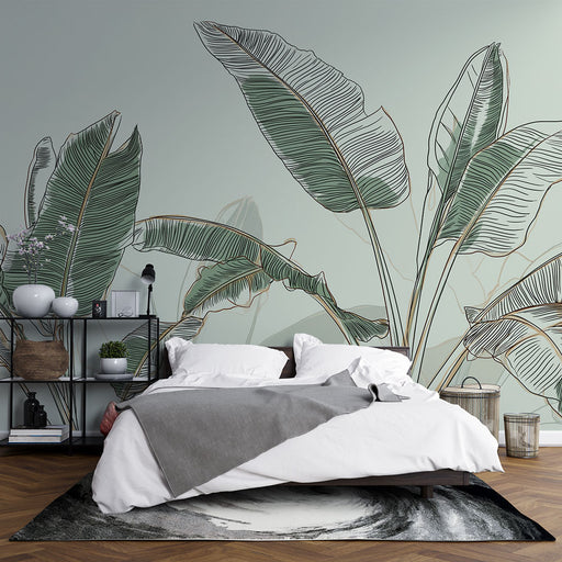 Une chambre moderne avec un papier peint représentant de grandes feuilles tropicales aux lignes délicates sur fond vert clair, créant une ambiance apaisante et naturelle.