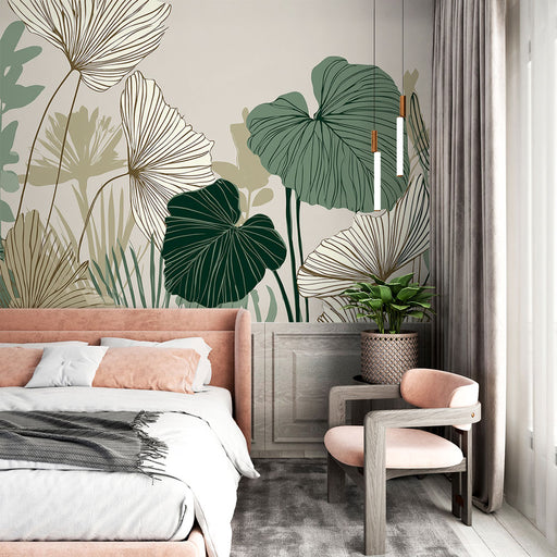 Une chambre moderne avec un papier peint botanique aux grandes feuilles vertes et dorées sur fond clair, créant une atmosphère apaisante et naturelle.
