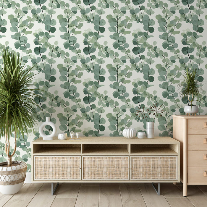 Une pièce moderne avec un papier peint végétal aux nuances de vert représentant des feuilles délicates sur fond clair, créant une atmosphère apaisante et naturelle.