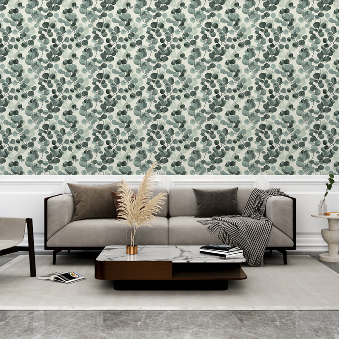 Un salon élégant avec un papier peint aux motifs de feuilles vertes et grises sur fond clair, créant une ambiance naturelle et apaisante.