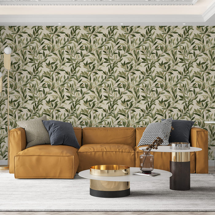 Un salon chaleureux avec un papier peint floral aux motifs de feuillage vert sur fond crème, créant une ambiance naturelle et apaisante.