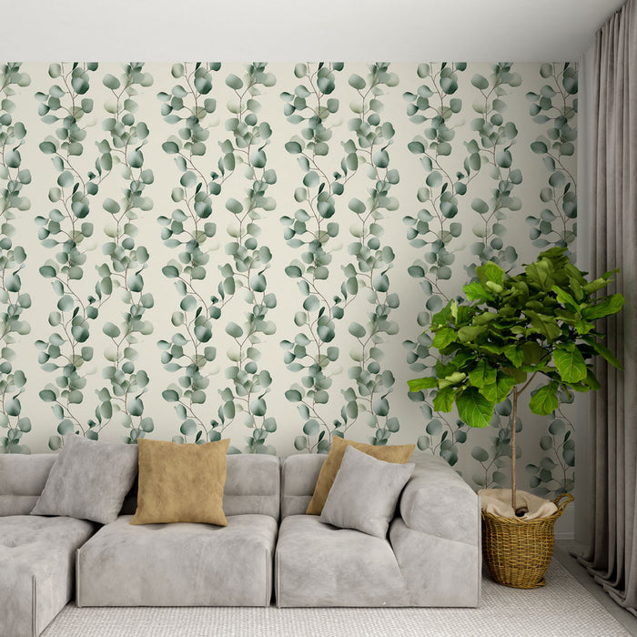 Un salon moderne avec un papier peint floral représentant des feuilles vertes délicates sur fond clair, créant une atmosphère apaisante et naturelle.