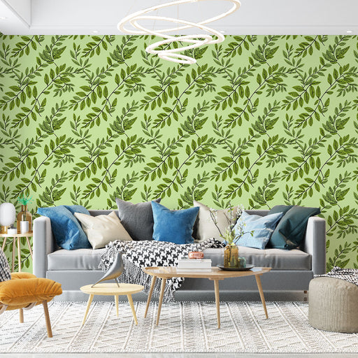 Un salon contemporain avec un papier peint vert clair orné de motifs de feuilles délicates, créant une atmosphère fraîche et apaisante.