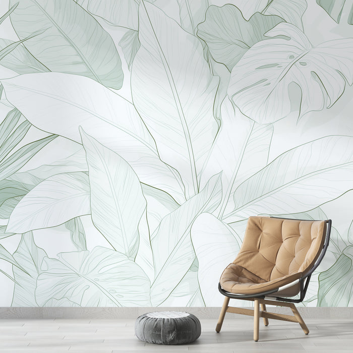 Une chambre moderne avec un papier peint tropical aux grandes feuilles vertes et blanches, créant une ambiance fraîche et apaisante.