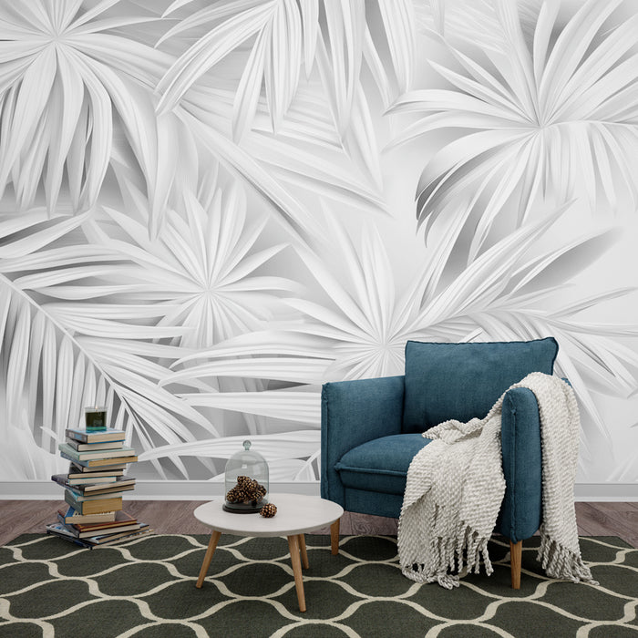 Une pièce de vie élégante avec un papier peint en relief représentant des feuilles tropicales blanches, créant une atmosphère apaisante et moderne.