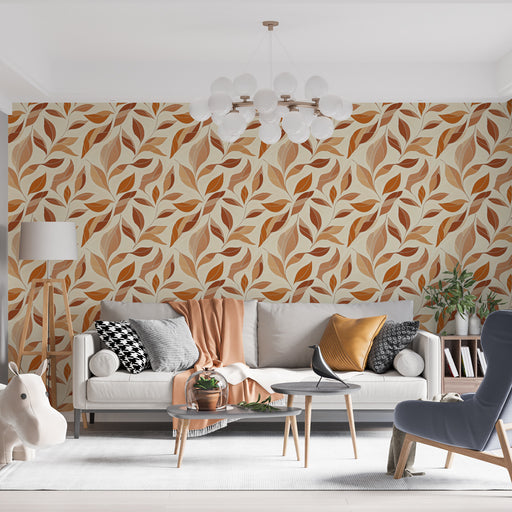 Un salon contemporain avec un papier peint aux motifs de feuilles en tons chauds de beige, orange et brun, créant une atmosphère chaleureuse et accueillante.
