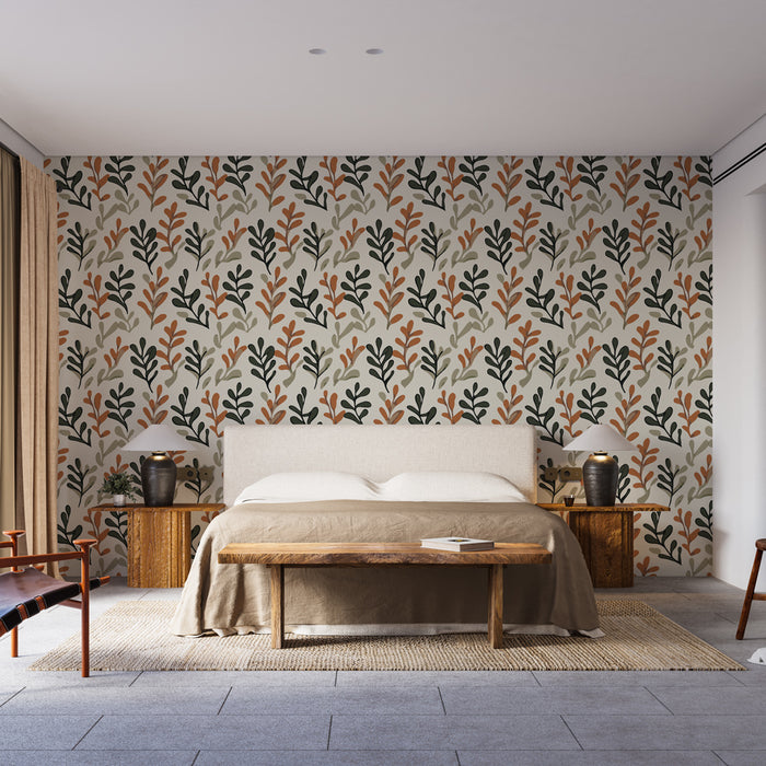 Une chambre moderne avec un papier peint aux motifs végétaux colorés dans des teintes de vert, orange et beige, créant une atmosphère chaleureuse et accueillante.