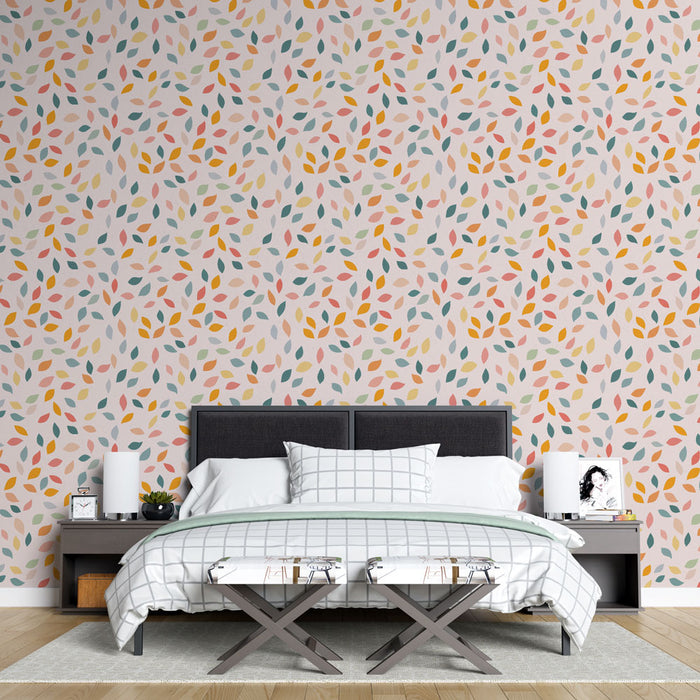 Une chambre moderne avec un papier peint aux motifs de feuilles colorées sur fond clair, créant une ambiance chaleureuse et joyeuse.