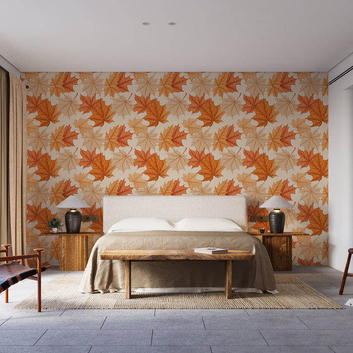 Une chambre moderne avec un papier peint aux motifs de feuilles d'érable orange et beige, créant une ambiance chaleureuse et automnale.