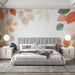 Papier peint feuilles d'automne avec motif délicat de feuilles aux teintes chaudes pour chambre moderne