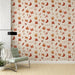 Une pièce moderne avec un papier peint floral aux teintes chaleureuses de rouge et d'orange, évoquant une ambiance automnale et accueillante.