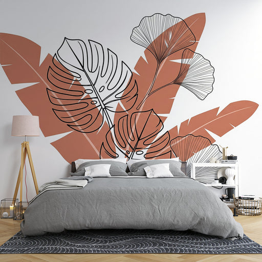 Une chambre moderne avec un papier peint tropical aux grandes feuilles stylisées en noir et terracotta, créant une ambiance chaleureuse et accueillante.