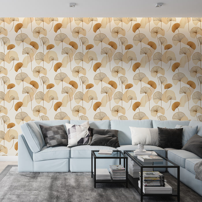 Un salon moderne avec un papier peint aux motifs de feuilles délicates dans des teintes beige et doré, créant une atmosphère élégante et chaleureuse.