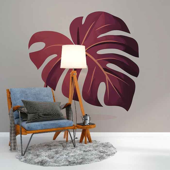Une pièce moderne avec un papier peint représentant une grande feuille de monstera aux teintes bordeaux sur fond gris, créant une ambiance chaleureuse et accueillante.