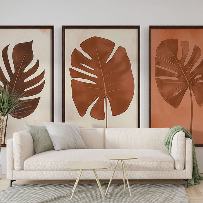 Papier peint feuilles de monstera | Trois feuilles de monstera dans des tons bruns