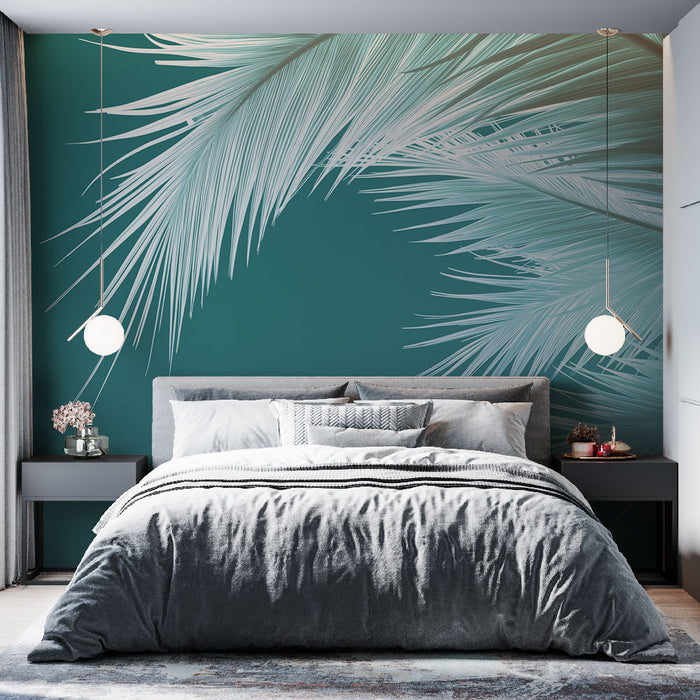 Une chambre moderne avec un papier peint tropical vert émeraude illustrant de grandes feuilles de palmier blanches, créant une atmosphère apaisante et rafraîchissante.