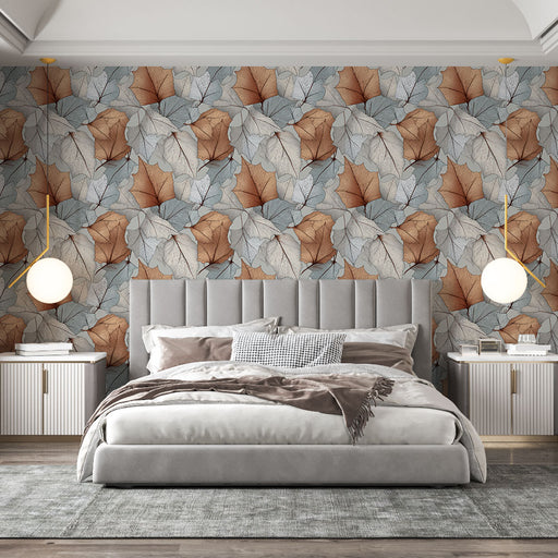 Une chambre élégante avec un papier peint aux motifs de feuilles en dégradés de bleu, beige et terracotta, créant une atmosphère chaleureuse et naturelle.