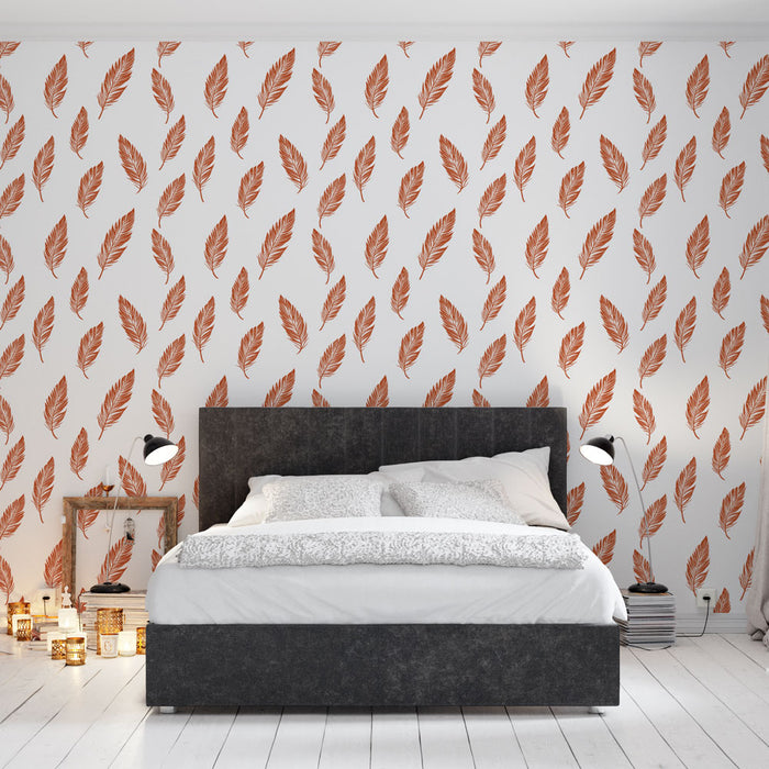 Une chambre moderne avec un papier peint aux motifs de feuilles en terracotta sur fond blanc, créant une ambiance chaleureuse et naturelle.