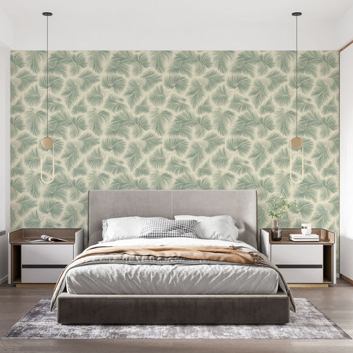 Une chambre moderne avec un papier peint aux motifs de feuilles délicates dans des teintes vertes sur fond crème, créant une atmosphère apaisante et naturelle.