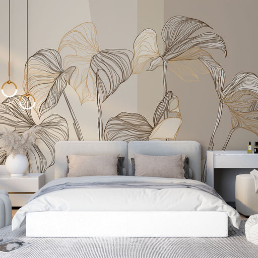Une chambre moderne avec un papier peint aux lignes dorées représentant de grandes feuilles stylisées sur un fond neutre, créant une ambiance élégante et apaisante.