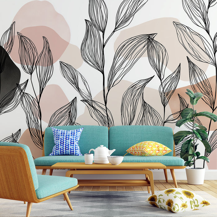 Un salon moderne avec un papier peint aux motifs de feuilles stylisées en noir sur un fond aux teintes douces de rose et beige, créant une ambiance apaisante et artistique.