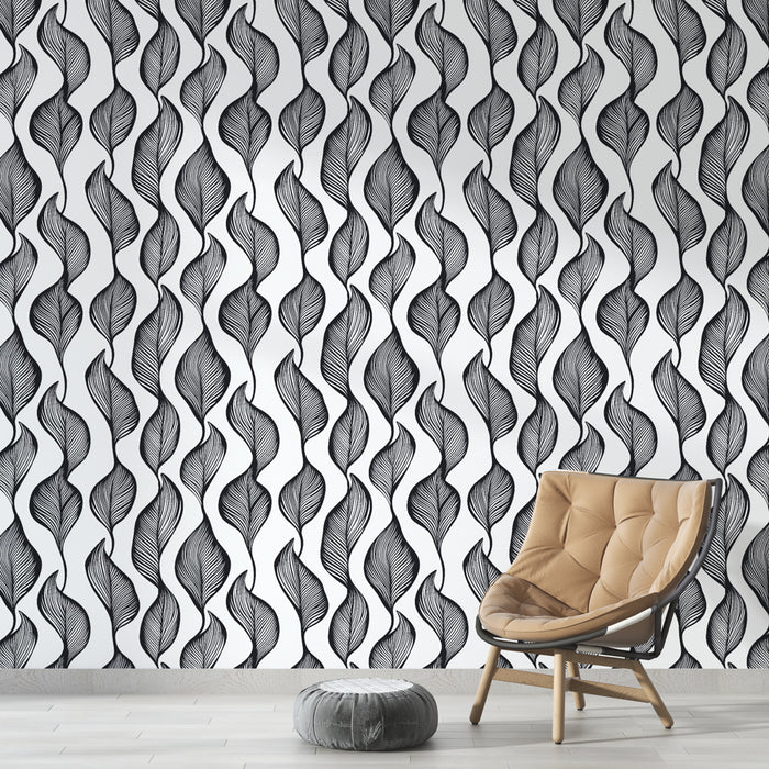 Une pièce moderne avec un papier peint noir et blanc représentant des feuilles stylisées en ondulations, créant une ambiance élégante et graphique.