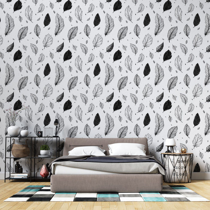 Une chambre moderne avec un papier peint illustrant des feuilles en noir et blanc, créant une atmosphère élégante et apaisante.