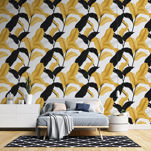 Une chambre moderne avec un papier peint aux motifs de feuilles stylisées en noir et jaune sur fond clair, créant une ambiance à la fois dynamique et chaleureuse.