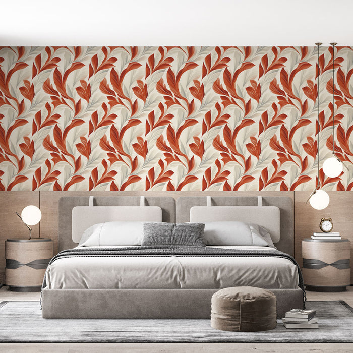 Une chambre élégante avec un papier peint floral aux motifs de feuilles rouge et crème, créant une ambiance chaleureuse et accueillante.