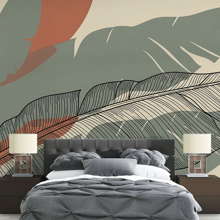 Une chambre moderne avec un papier peint aux motifs de grandes feuilles stylisées dans des teintes douces de vert et d'orange, créant une atmosphère apaisante et naturelle.