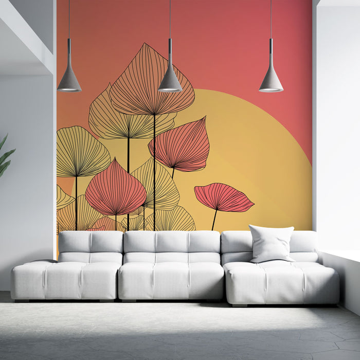 Un salon contemporain avec un papier peint aux motifs de feuilles stylisées en noir et rose sur un dégradé de jaune et rouge, créant une atmosphère chaleureuse et artistique.