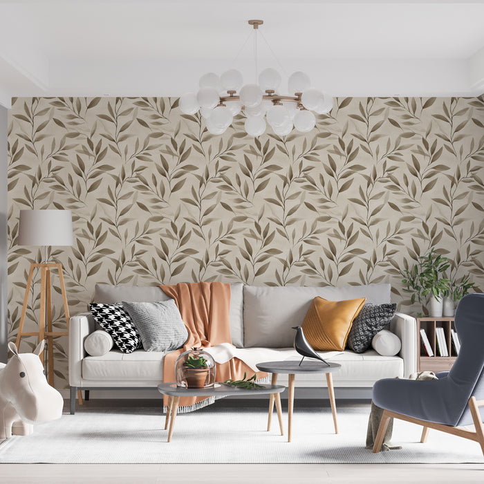 Un salon lumineux avec un papier peint aux motifs de feuilles dans des teintes beiges et brunes, créant une atmosphère chaleureuse et naturelle.