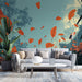 Un salon moderne avec un papier peint représentant des feuilles orange flottant sur un fond bleu-vert, créant une atmosphère chaleureuse et apaisante.