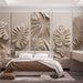 Une chambre moderne avec un papier peint texturé beige représentant des feuilles tropicales en relief, créant une atmosphère chaleureuse et apaisante.