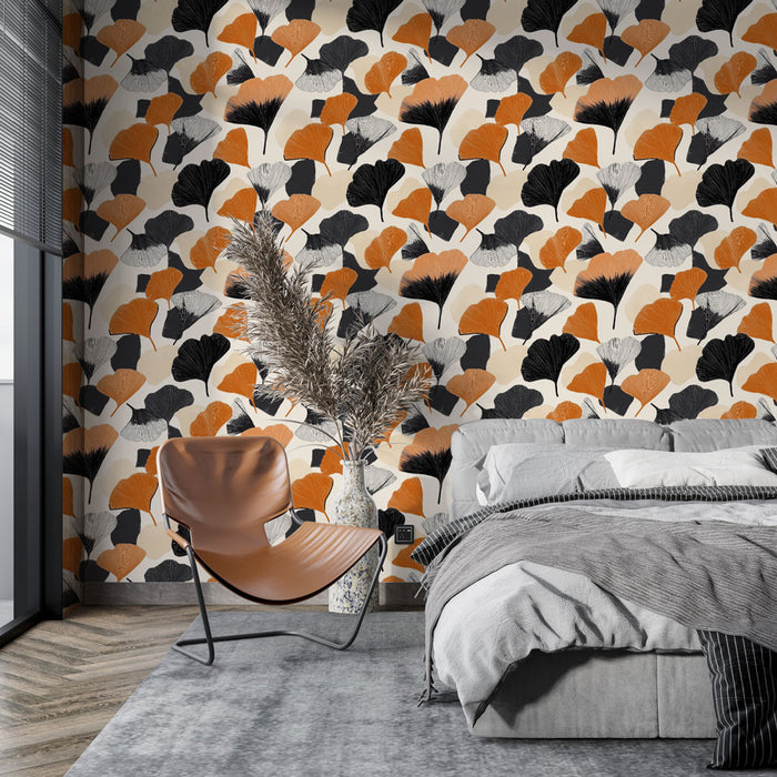 Une chambre moderne avec un papier peint aux motifs de feuilles stylisées en noir, orange et gris sur un fond clair, créant une ambiance dynamique et chaleureuse.