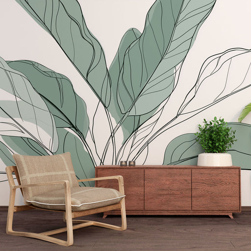 Une pièce moderne avec un papier peint représentant de grandes feuilles vertes aux contours noirs, créant une ambiance naturelle et apaisante.