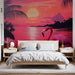 Une chambre lumineuse avec un papier peint tropical représentant un flamant rose sur fond de coucher de soleil vibrant, évoquant une ambiance chaleureuse et relaxante.