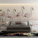 Une chambre moderne avec un papier peint représentant des flamants roses stylisés sur un fond doux, créant une ambiance apaisante et artistique.
