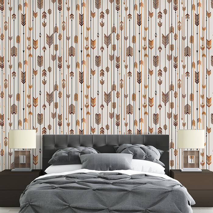 Une chambre moderne avec un papier peint graphique représentant des flèches stylisées dans des teintes chaudes sur fond clair, créant une ambiance dynamique et chaleureuse.