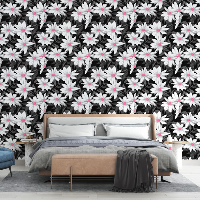 Une chambre moderne avec un papier peint floral noir et blanc, agrémenté de touches roses, créant une ambiance à la fois élégante et vivifiante.