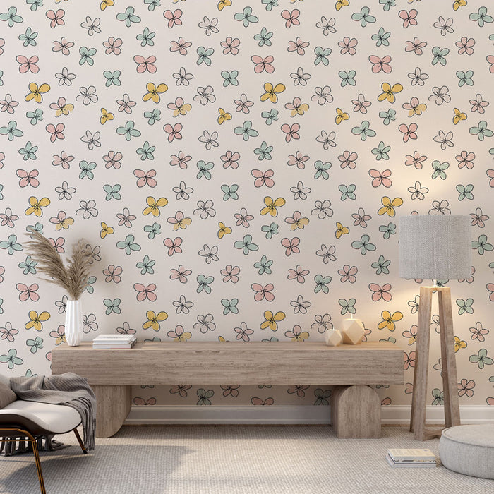 Une pièce lumineuse avec un papier peint floral aux motifs de petites fleurs colorées, créant une atmosphère joyeuse et douce.