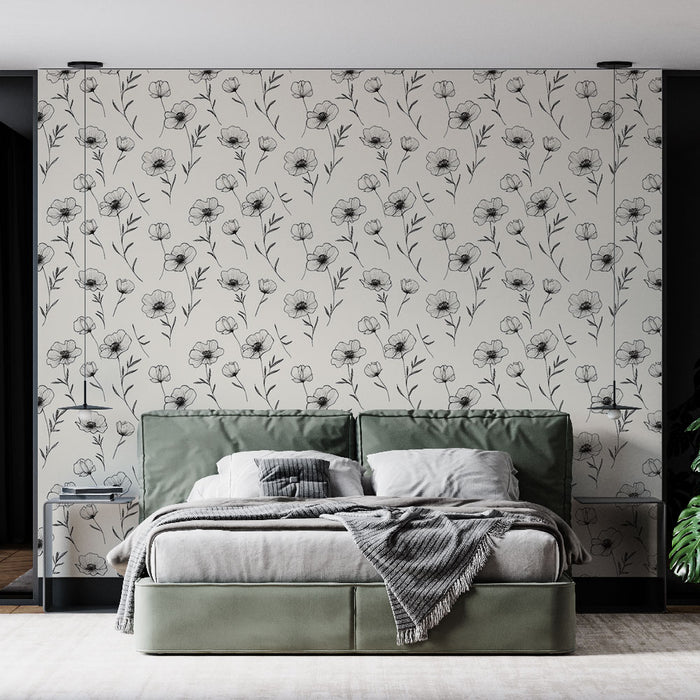 Une chambre moderne avec un papier peint floral en noir et blanc représentant des fleurs délicates, créant une atmosphère douce et apaisante.