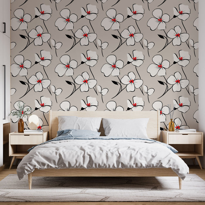 Une chambre lumineuse avec un papier peint floral en noir et blanc, rehaussé de touches rouges, créant une ambiance à la fois élégante et vivante.