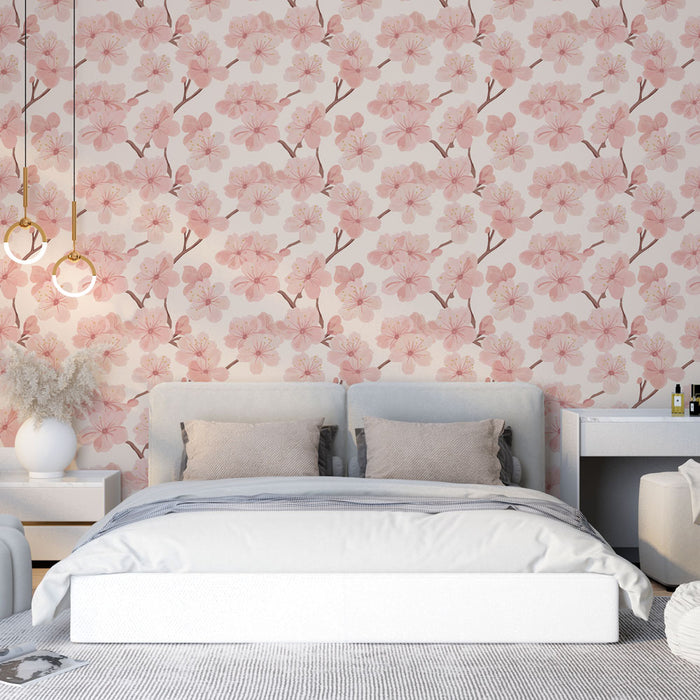 Une chambre apaisante avec un papier peint floral aux délicates fleurs roses sur fond clair, évoquant une atmosphère douce et romantique.