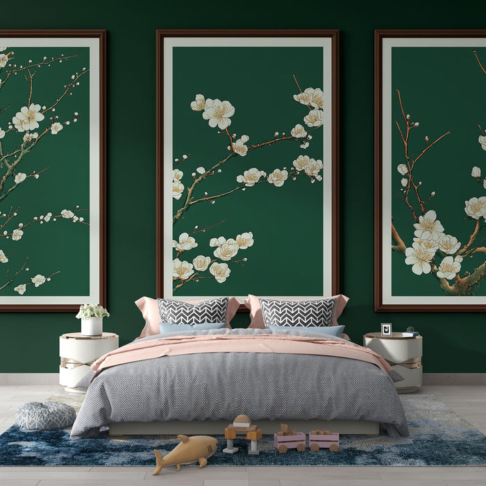 Une chambre élégante avec un papier peint vert foncé orné de branches fleuries blanches, créant une atmosphère apaisante et naturelle.